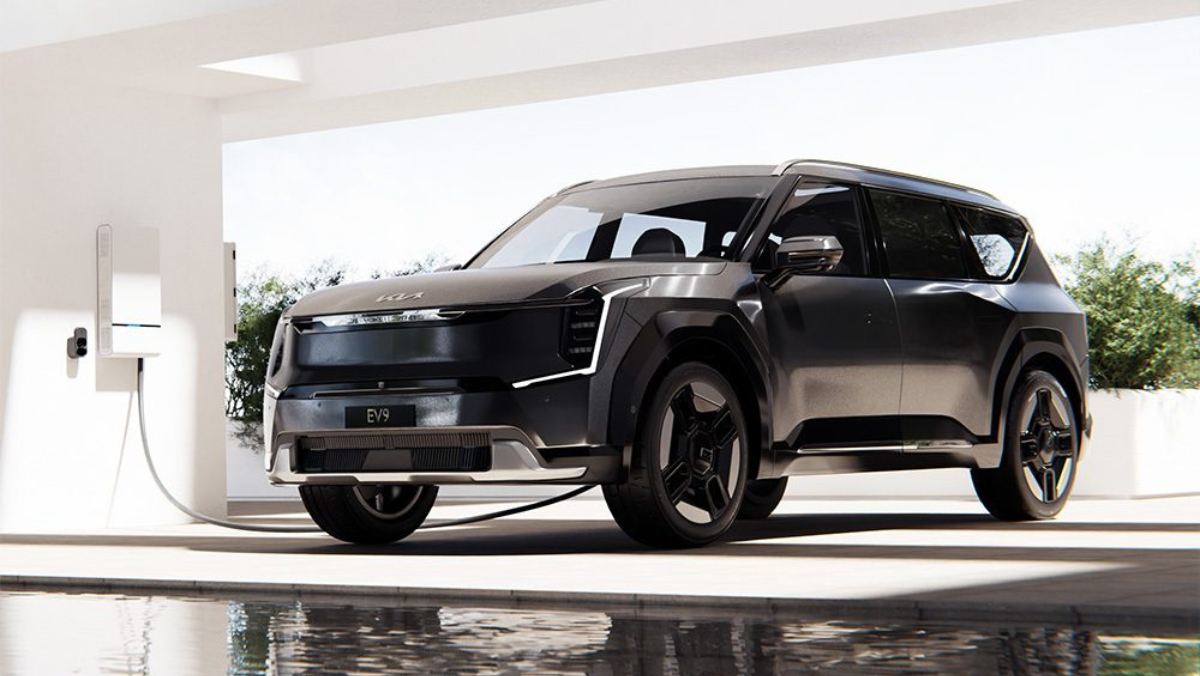 Electric SUV charging with a bidirectional home charger, showing emerging vehicle-to-grid energy capability